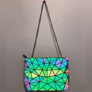 Geometric reflective purse.